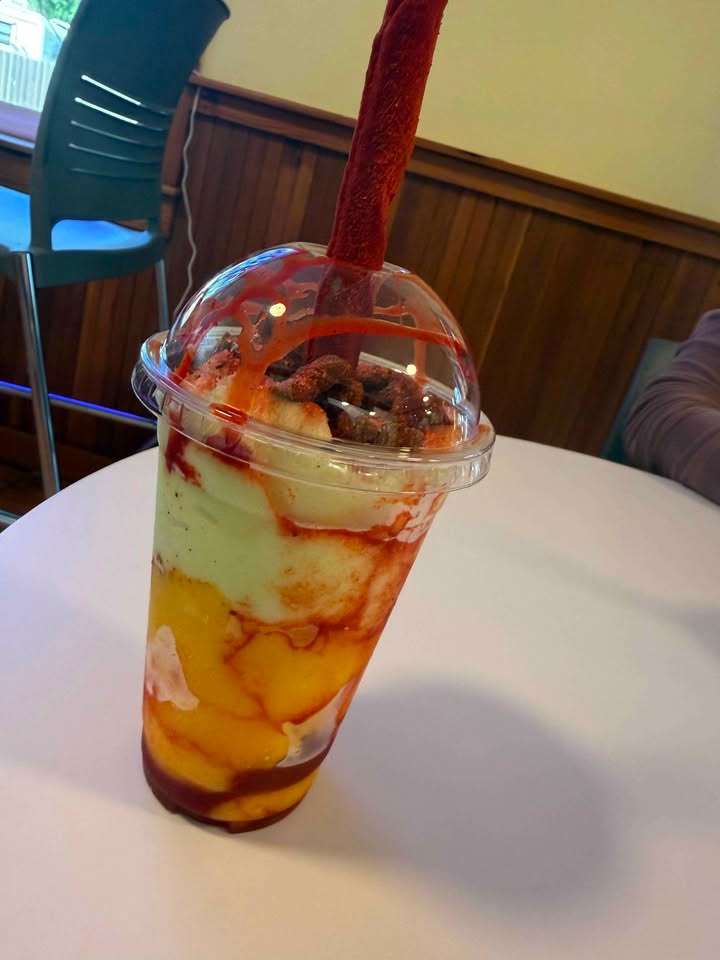 Mangonada with tamarindo candy straw