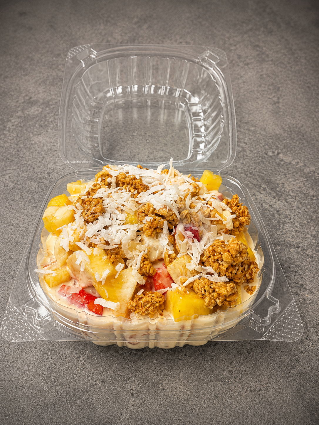 Bionico with fresh fruit, cream, granola, and coconut